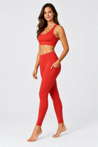 Women’s racer back gym set in red - side view