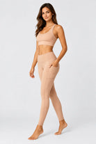 Women’s racer back gym set in skin - side view